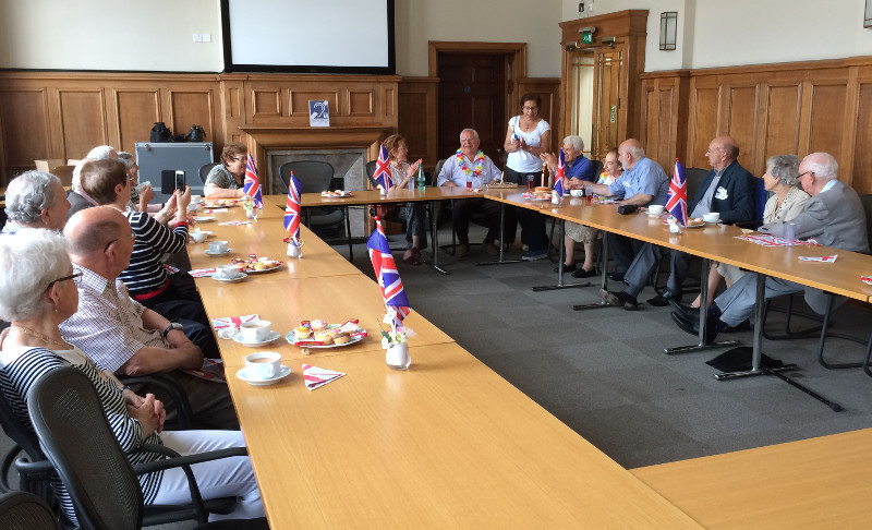 Dementia Club UK members singing 'Happy Birthday' at Hendon Town Hall, Union Jack flags are to celebrate the GB teams Olympic medals Dementia Club UK members singing 'Happy Birthday' at Hendon Town Hall, Union Jack flahs are to celebrate the GB teams Olympic medals