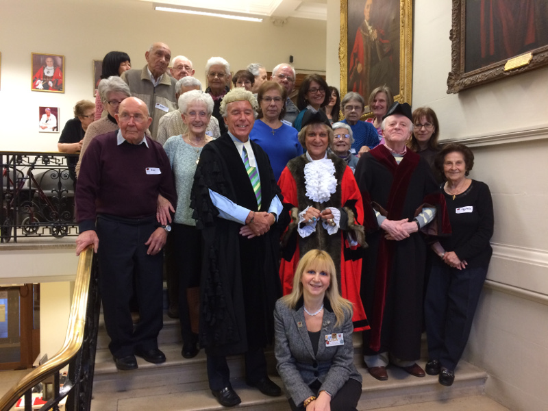 Members of Dementia Club UK on stairs at Hendon Town Hall